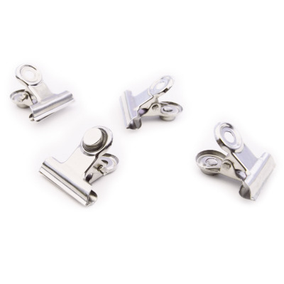 Mini GRAFFA magnetic clips from Trendform in a 4-pack. Made with a strong neodymium magnet on the back.