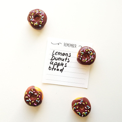 Use the brown donut magnets as magnets on your fridge. Looks fun when you hang up small notes like a shopping list or a recipe with these fridge magnets.