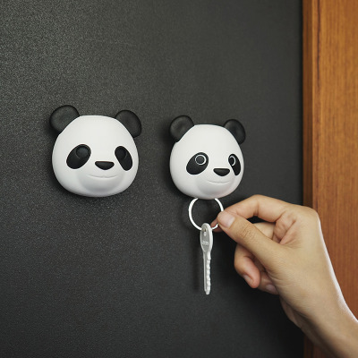 The cutest feature ever: the opening and closing eyes - they will open when you attach the key ring to the panda and close again when removing the keys.