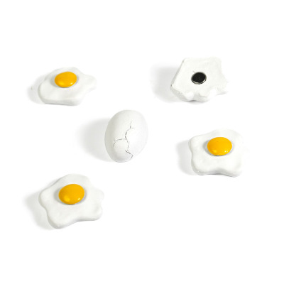 Fried eggs and a hard boild egg for the fridge - magnets do not have to be plain and boring.