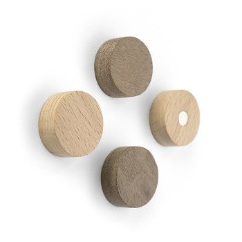 Wood round magnets from Trendform is a package of 4 wooden discs with a strong magnet on the back. You get 2 dark and 2 light magnets.