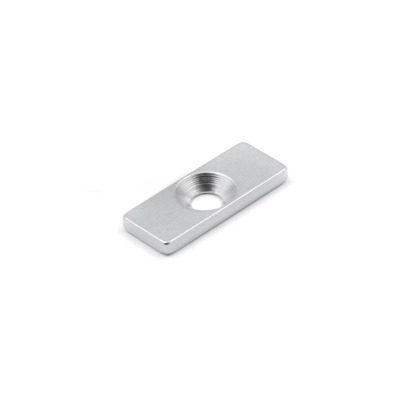 Recessed metal plate, 30x12x3 mm. - an oblong metal piece with a countersunk screw hole (M5)