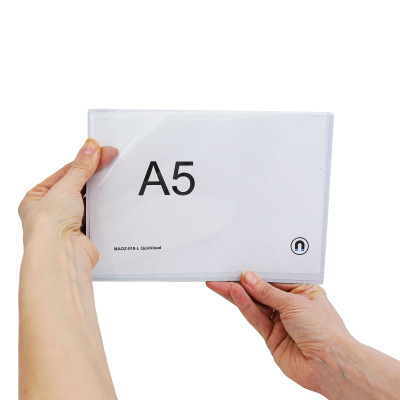 This magnetic pocket is with a white front and quickload opening. Very flexible and easy to use. The backside is made with black magnetic foil. White pockets create a white "frame" around your papers.
