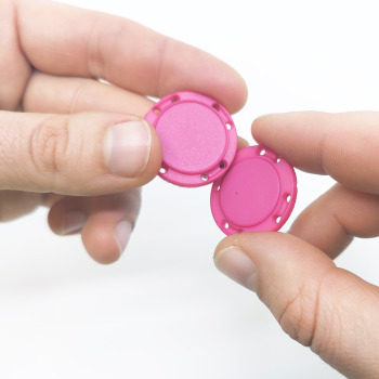 Rose colored magnetic button for sewing into clothing and costumes - a set with two parts that attract with a strength of about 2.5 kg.
