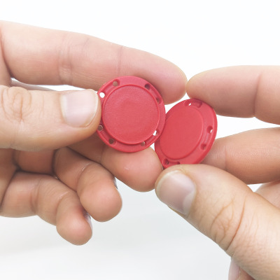Magnetic button for sewing into clothing and costumes - a set with two parts that attract with a strength of about 2.5 kg.